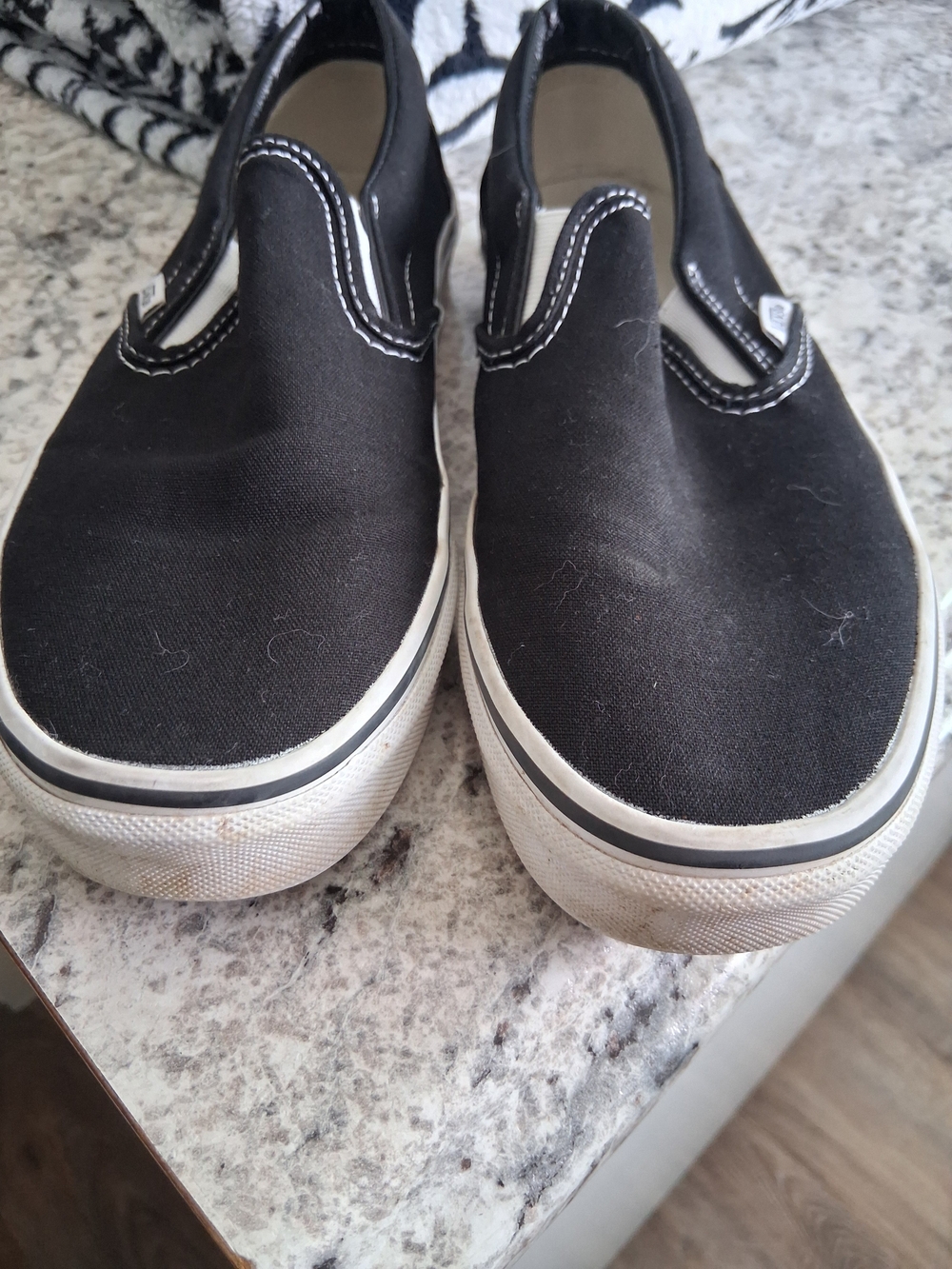 Vans Black Slip-On Canvas Sneakers with White Sole